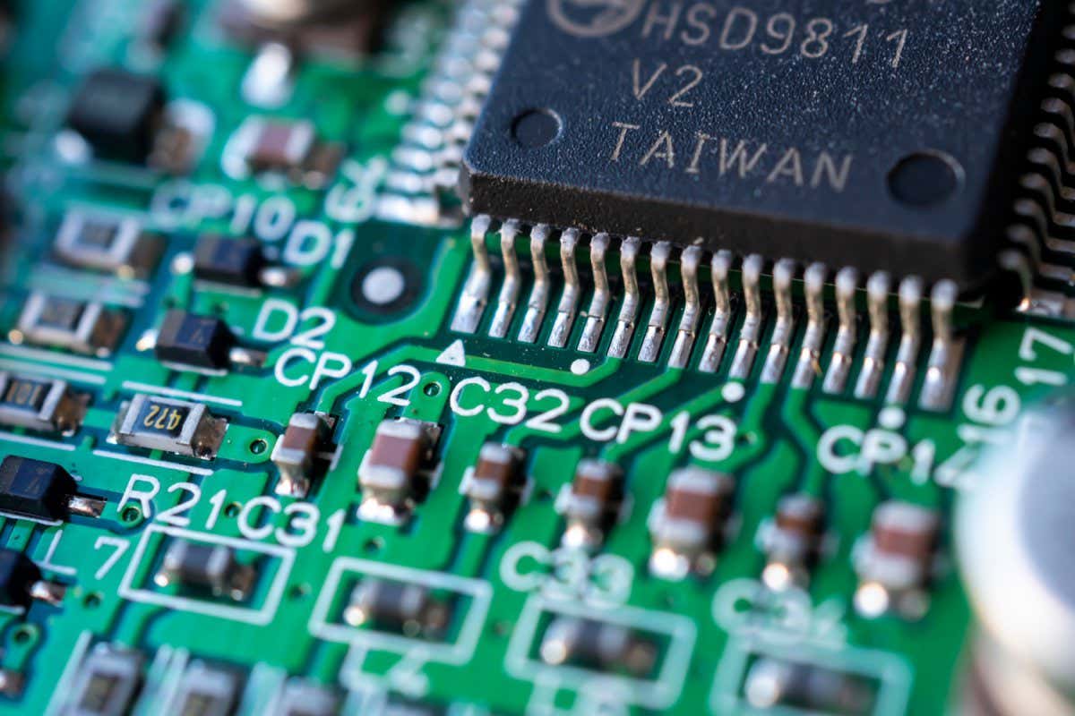 Close up Macro shooting of computer main board or circuit board's integrated elements. Made in Taiwan, Science and Technology concept