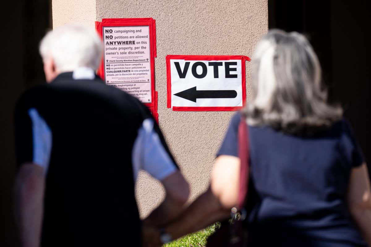 UNITED STATES - OCTOBER 24: A couple arrives to vote the Anthem Center in Henderson, Nev., during early voting in Nevada on Monday, October 24, 2022. (Bill Clark/CQ-Roll Call, Inc via Getty Images)