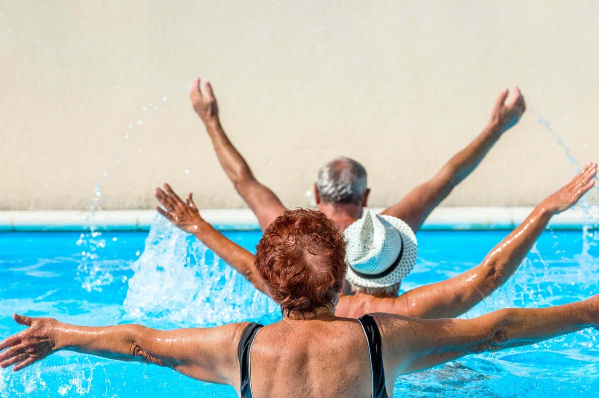 person aged group doing water aerobics in a swimming pool during a spa treatment; Shutterstock ID 167286806; purchase_order: -; job: -; client: -; other: -
