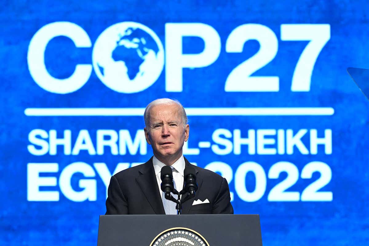 US President Joe Biden delivers a speech during the COP27 summit in Egypt's Red Sea resort city of Sharm el-Sheikh, on November 11, 2022. - Biden arrived at UN climate talks in Egypt today, armed with major domestic achievements against global warming but under pressure to do more for countries reeling from natural