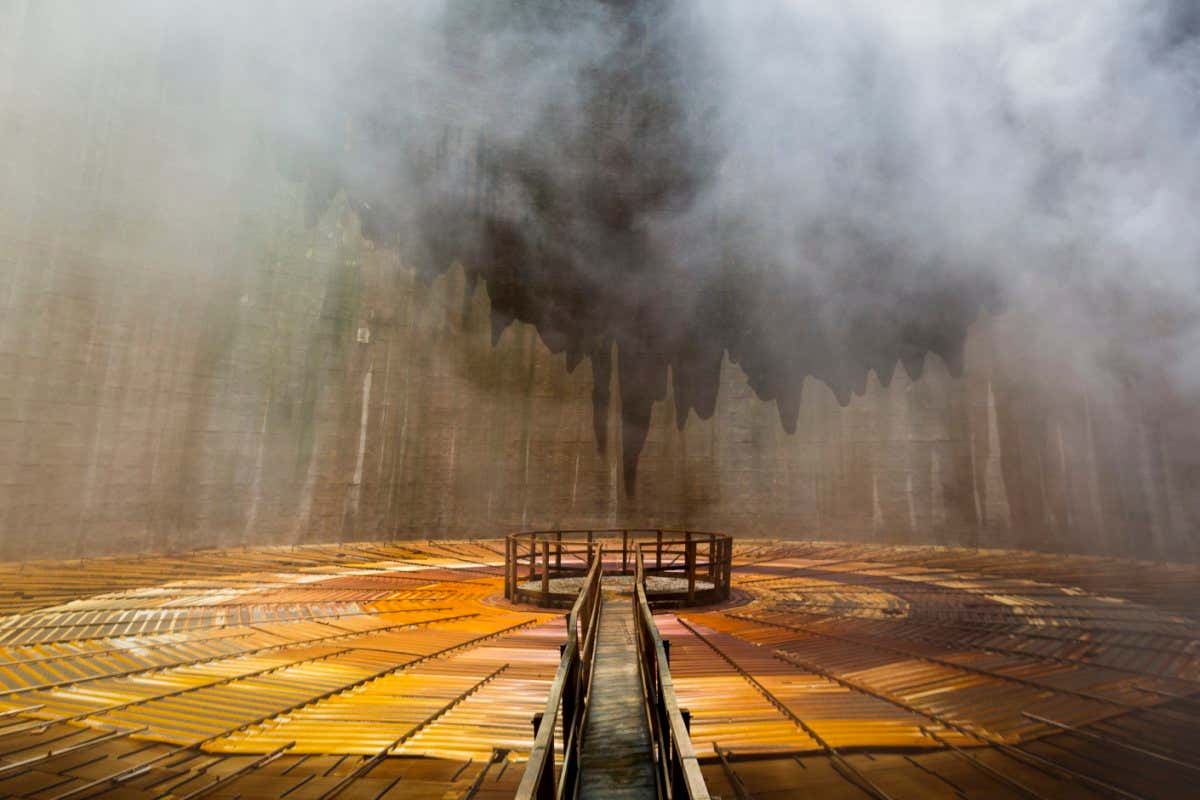 Inside the natural draft cooling tower of the "Monterotondo 1" geothermal power plant near Monterodonto Marittimo (GR), Italy. The cooling tower cools the water necessary for the condensation of the endogenous vapor.