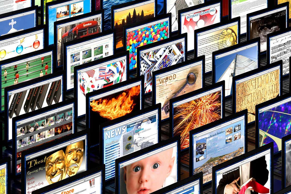 Laptop screens showing various website