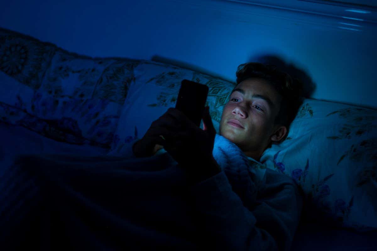 Teenagers may get more sleep if they keep their phone away from their bed at night