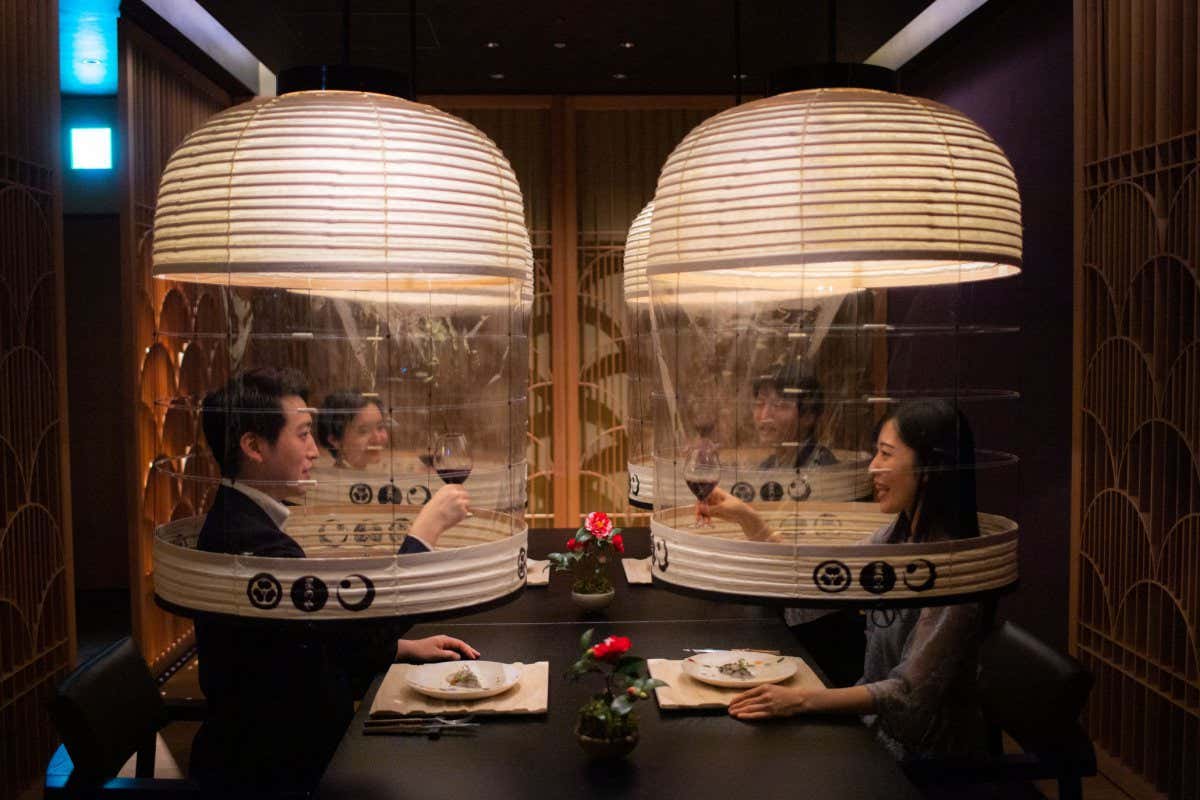 TOPSHOT - Staff members from the Hoshinoya Tokyo hotel demonstrate the 