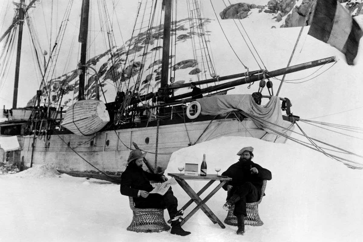 Ernest Gourdon and Paul Pl?neau sharing a bottle of Mumm champagne on 14/15 July 1904, Jean-Baptiste Charcot?s birthday. Photo by Ernest Gourdon. ? Courtesy of G. H. Mumm & Cie, Reims, France
