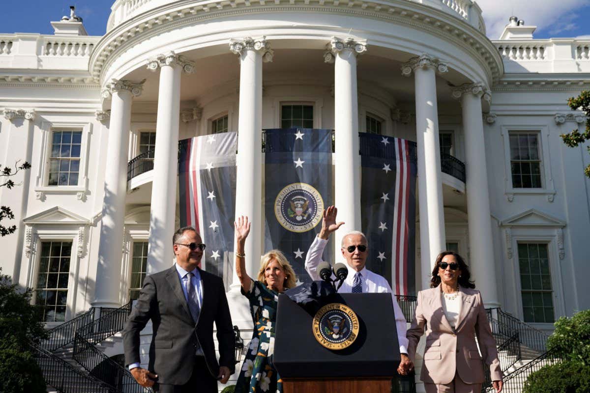 US President Joe Biden celebrating the enactment of the Inflation Reduction Act