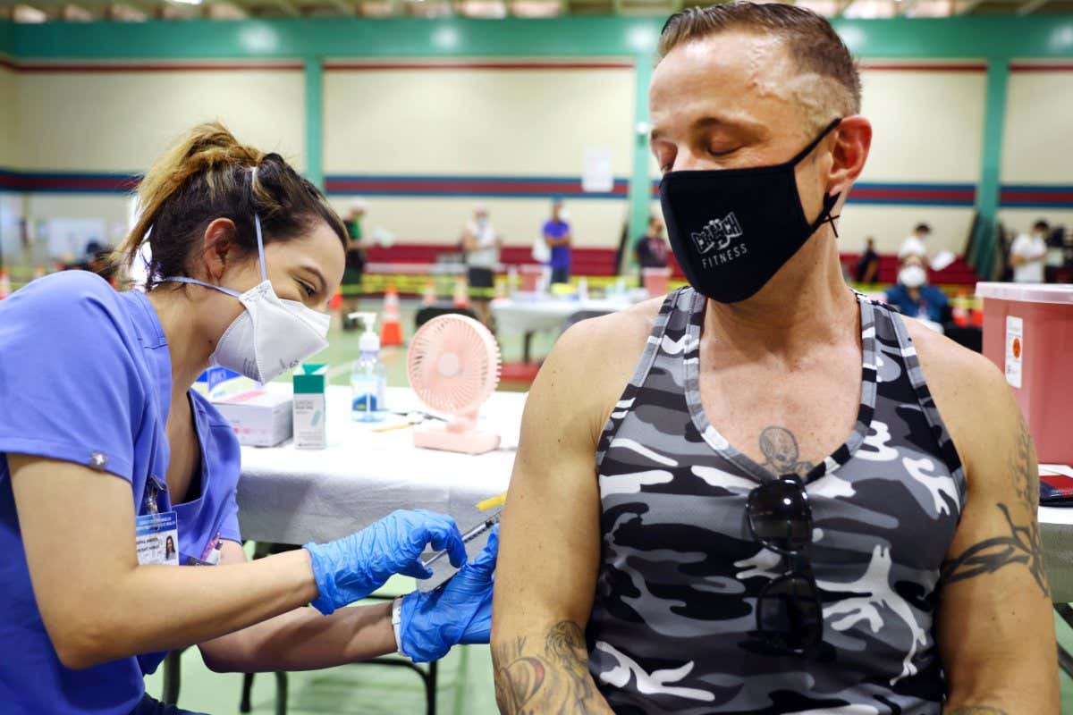 A person receives a smallpox vaccine to protect against mpox in LA, California, in August 2022