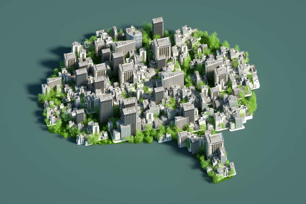 Digital generated image of Sustainable city in shape of human brain on green background.