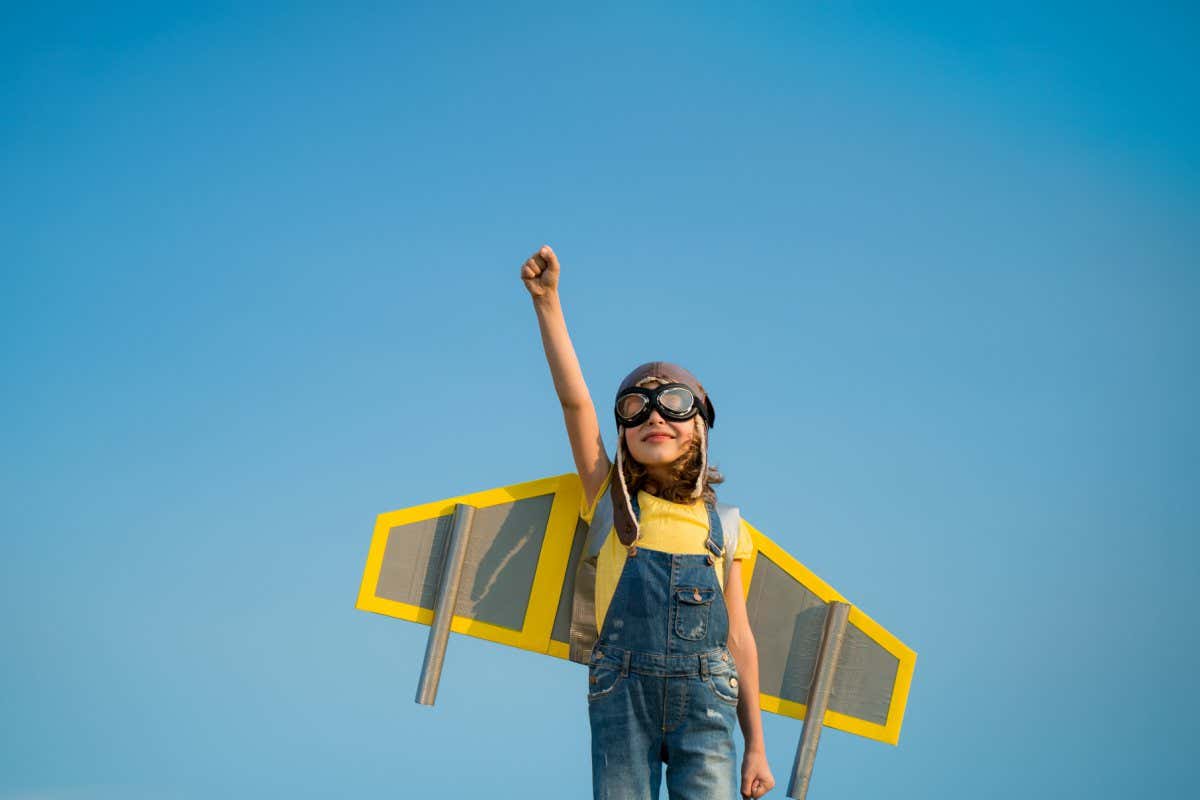 Kid with jet pack pretend to be superhero. Child playing in summer. Kid having fun outdoors. Child pilot against summer sky background. Success, leader and winner concept. Imagination, freedom concept; Shutterstock ID 450428614; purchase_order: -; job: -; client: -; other: -