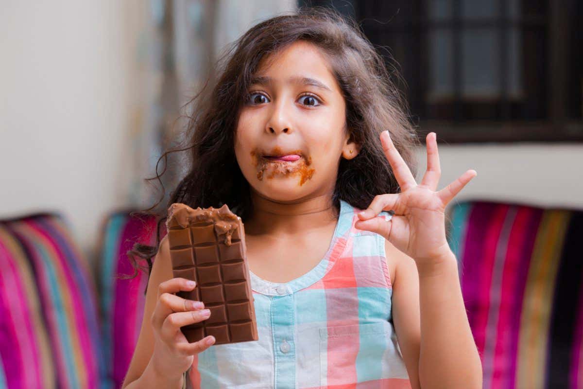 Girl eating chocolate