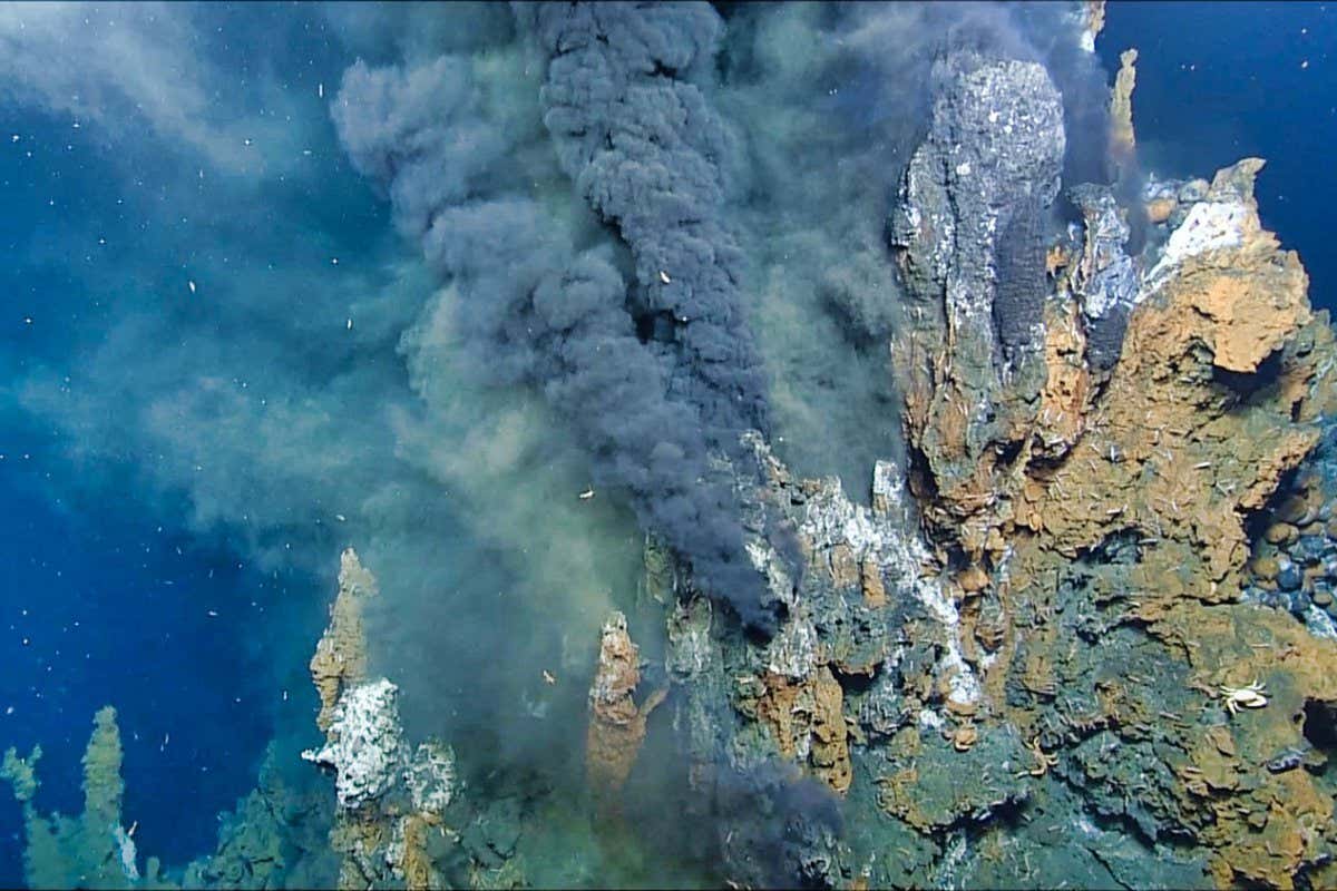 https://www.usgs.gov/media/images/mineral-laden-water-emerging-hydrothermal-vent Mineral-laden water emerging from a hydrothermal vent on the Niua underwater volcano in the Lau Basin, southwest Pacific Ocean. As the water cools, minerals precipitate to form tower-like ?chimneys.? Image taken during 2016 cruise ?Virtual Vents.?