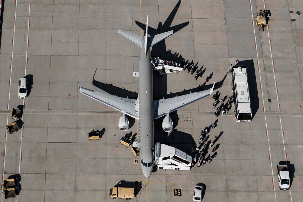 What is the most efficient way to load passengers into an aircraft?