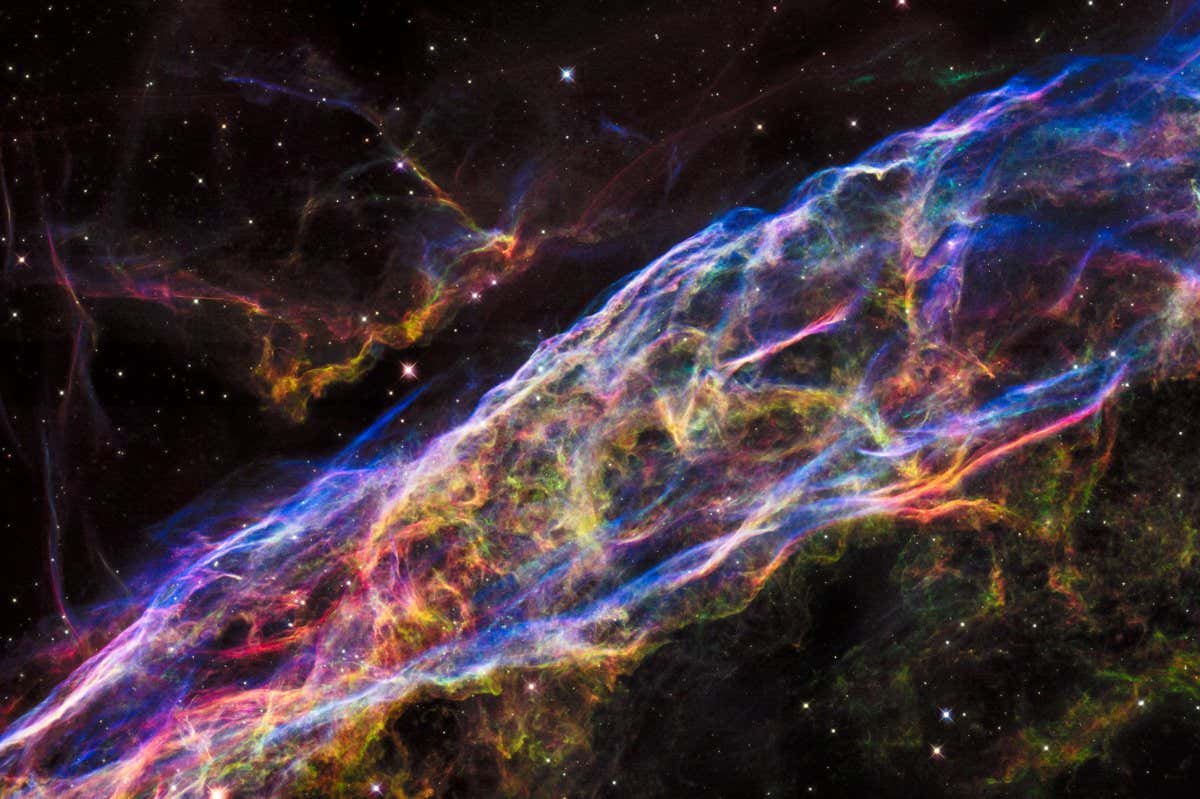 This image shows a small section of the Veil Nebula, as it was observed by the NASA/ESA Hubble Space Telescope. This section of the outer shell of the famous supernova remnant is in a region known as NGC 6960 or ??? more colloquially ??? the Witch???s Broom Nebula. https://esahubble.org/images/heic1520a/