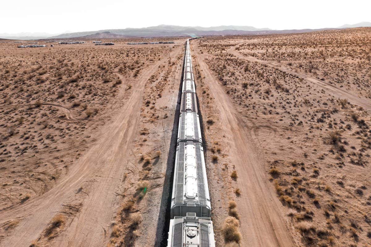 Long freight train in the middle of the desert of California.
