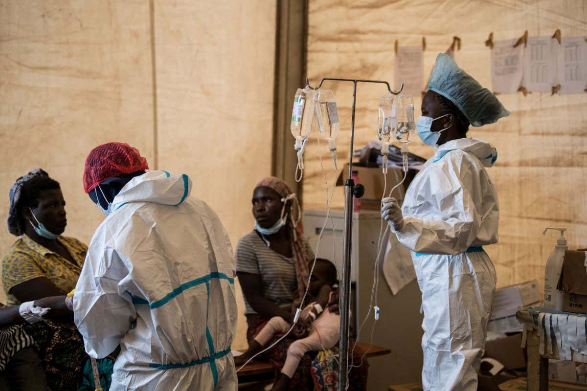 Health workers treat people with cholera at a hospital in Lilongwe, Malawi, in January 2023