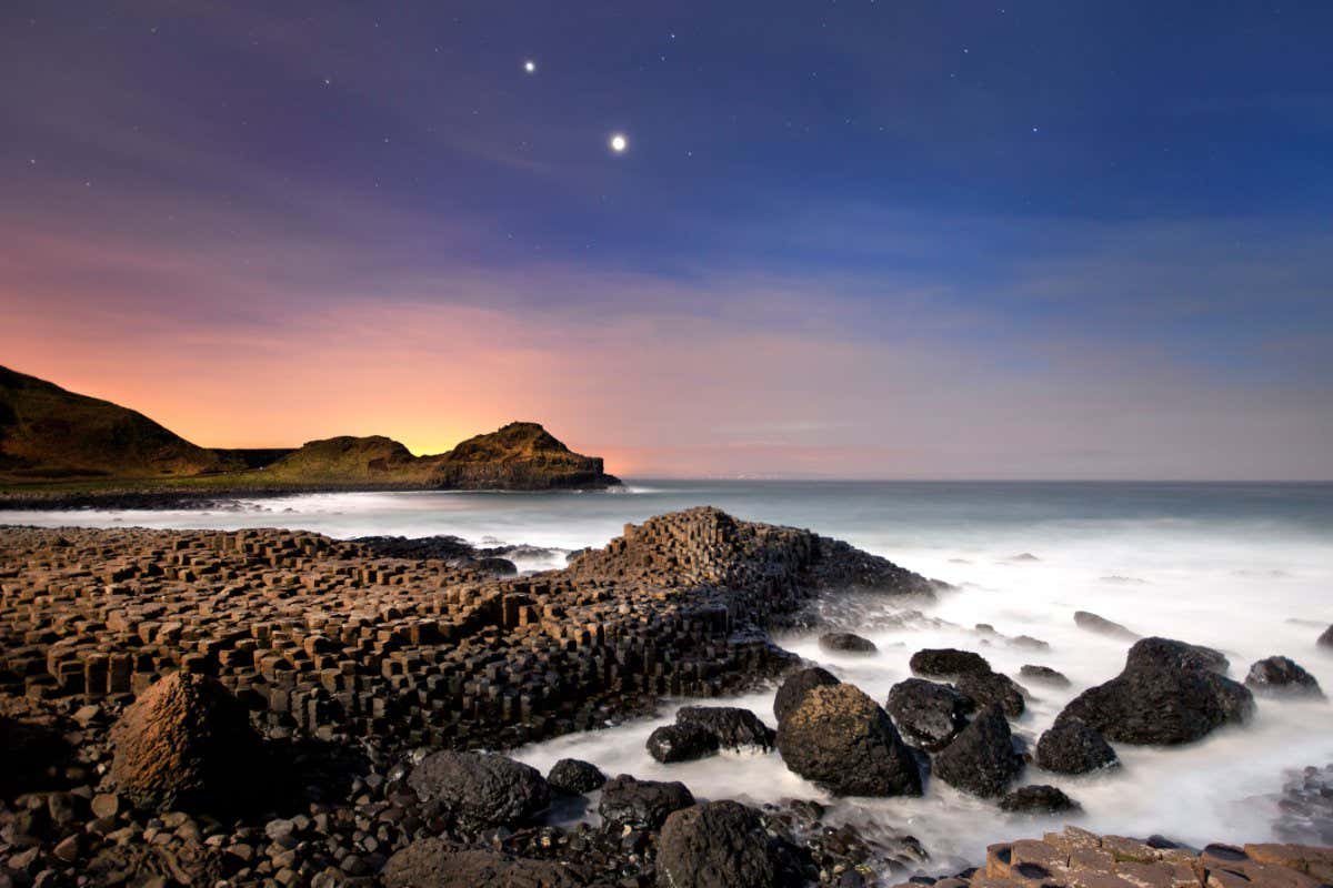 Conjunction of Jupiter and Venus as seen from the Giants Causeway in Northern Ireland