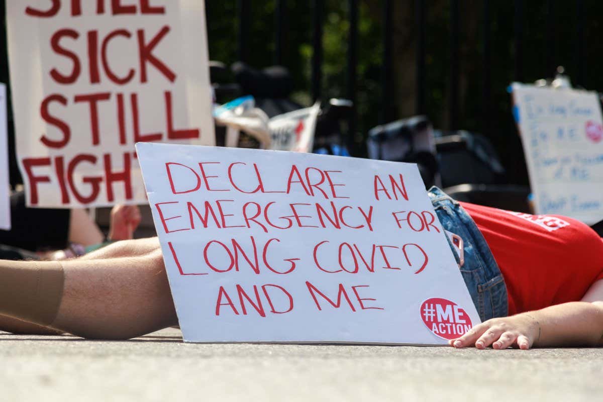 A protest outside the White House, Washington DC, in September 2022 urging government action for people with myalgic encephalomyelitis, long covid and other infection-associated chronic conditions