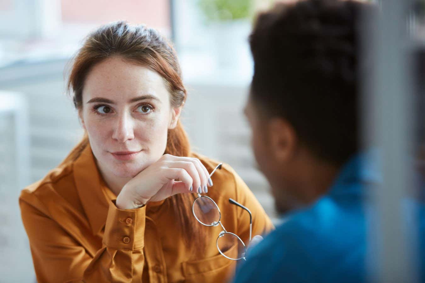 Woman looking at man