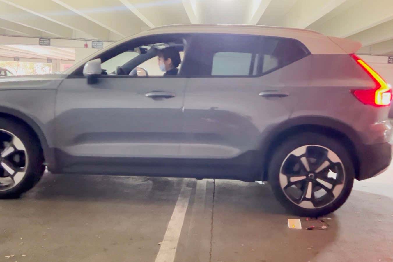 A car slowly driving over a battery