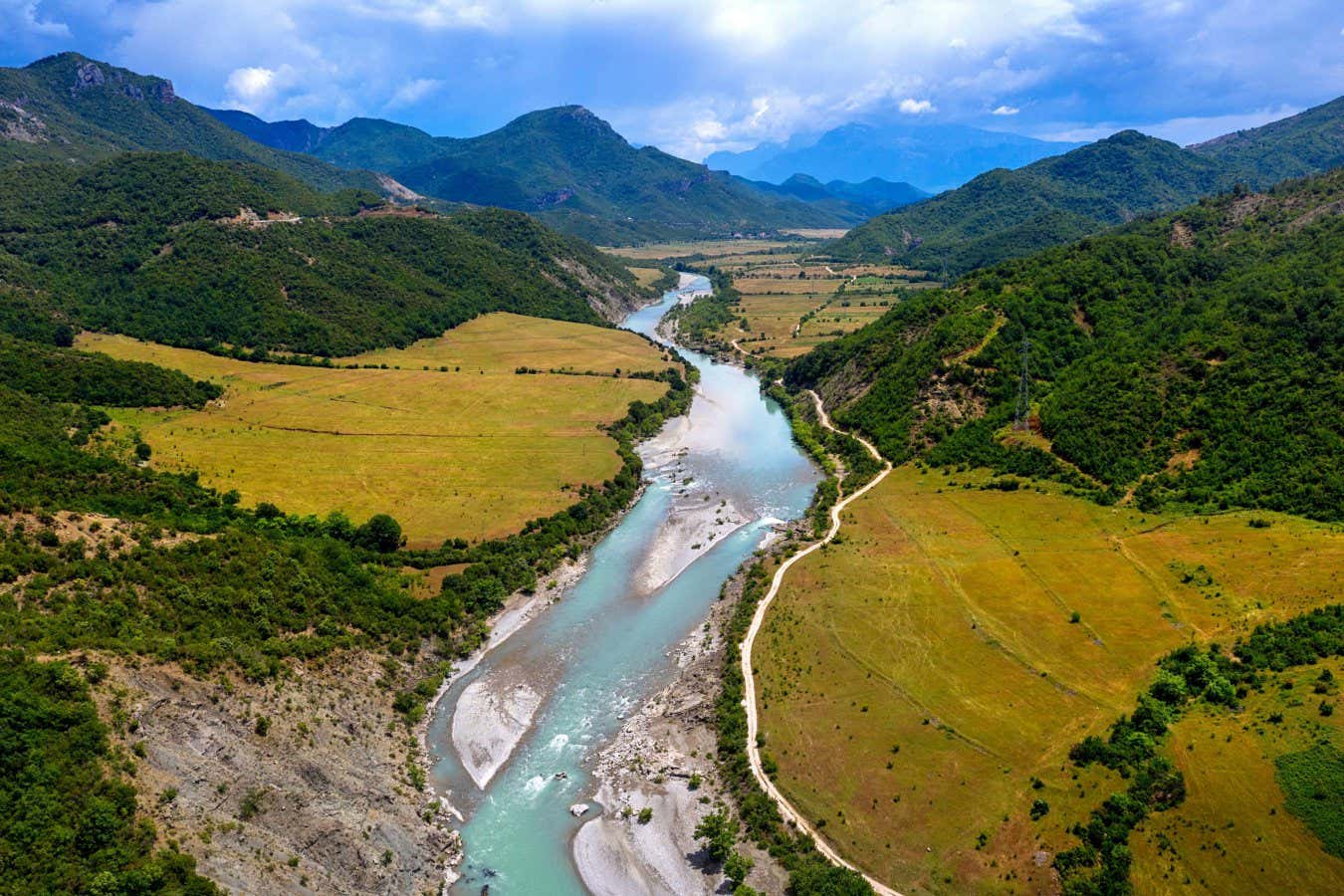 2GAXKAF aerial view of a beautiful Vjosa river, near Earcove, Nemercka mountains, Gjirokastra district, albania