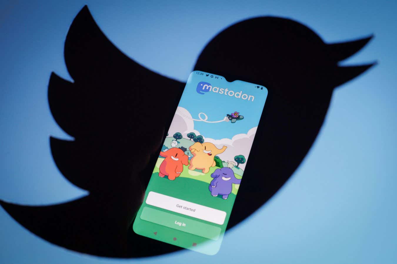 2KEHETN The Twitter and Mastodon app logos are seen in this photo illustration in Warsaw, Poland on 12 November, 2022. Mastodon is a decentralized, open-sourc