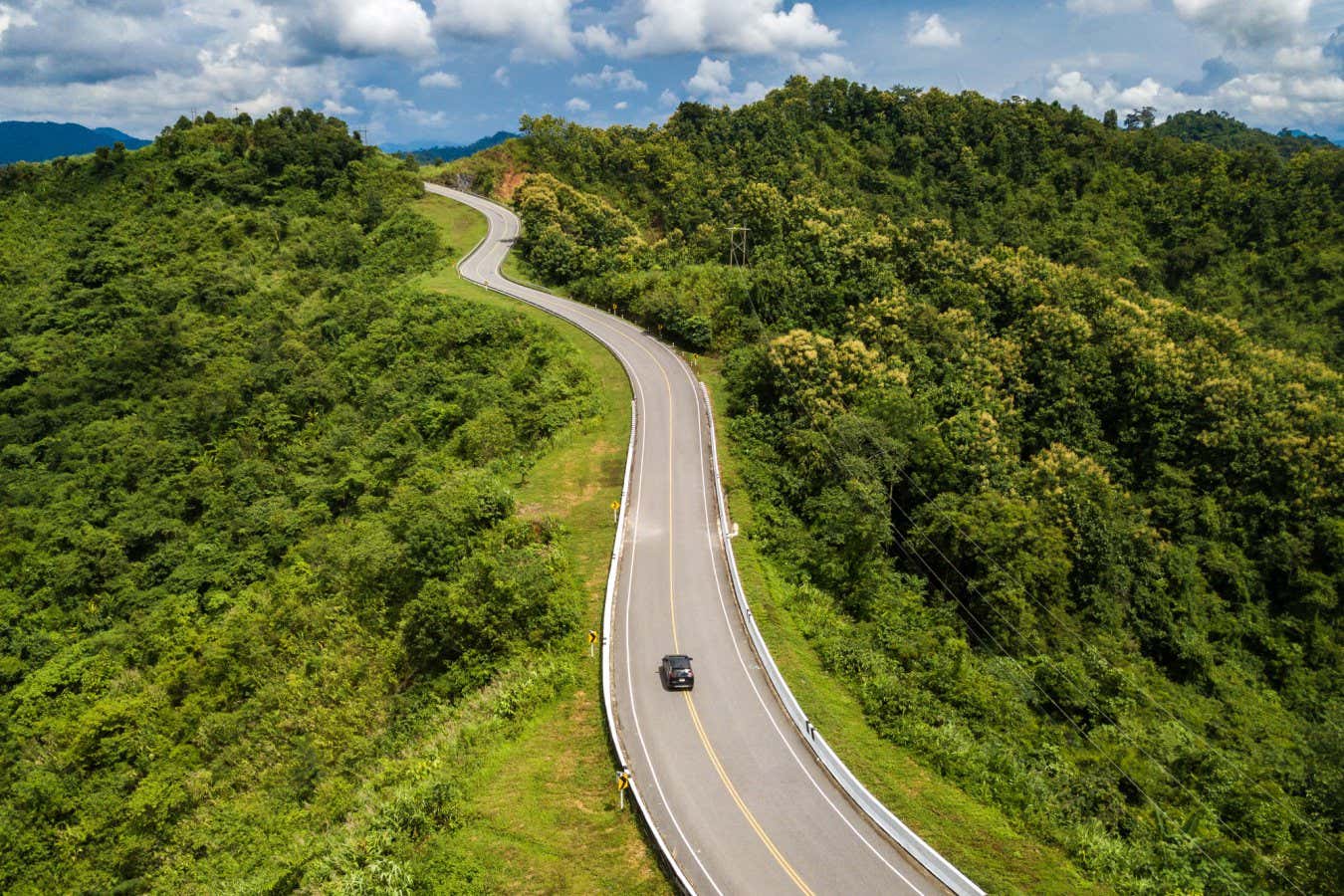 Aerial view of car driving on beautiful steep curved road (look like number 3) on the high mountain in Nan province, Thailand.; Shutterstock ID 1815816242; purchase_order: -; job: -; client: -; other: -