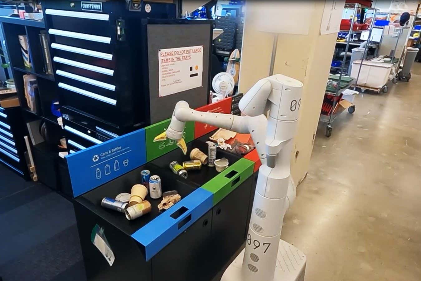 A robot learning how to sorting rubbish in a Google office