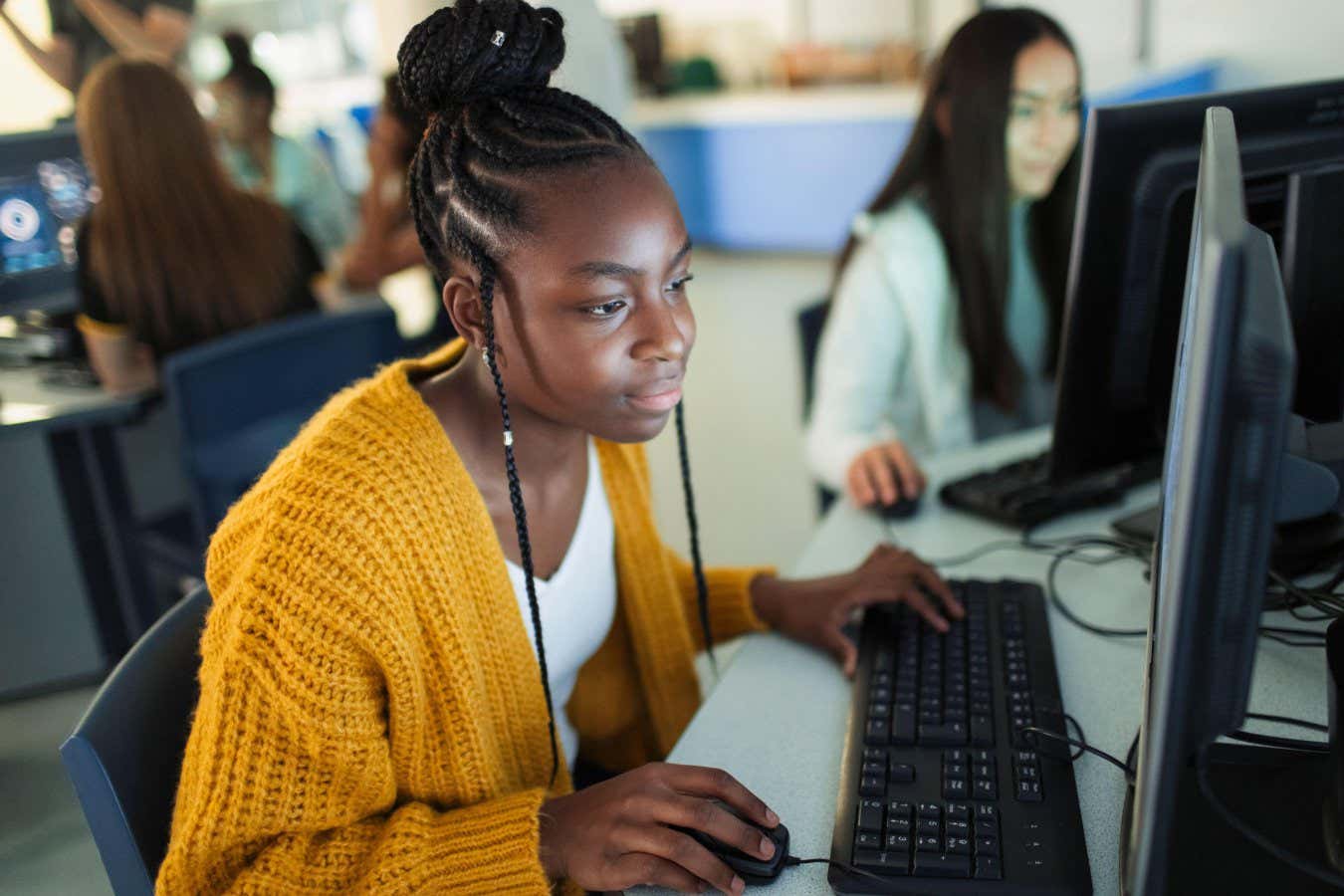 A girl working at a computer