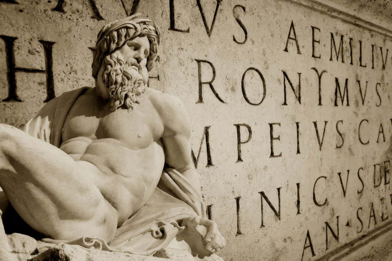 Bernini statue detail of Gange with Latin words engraved on a wall Roman Capitol; Shutterstock ID 131482886; purchase_order: -; job: -; client: -; other: -