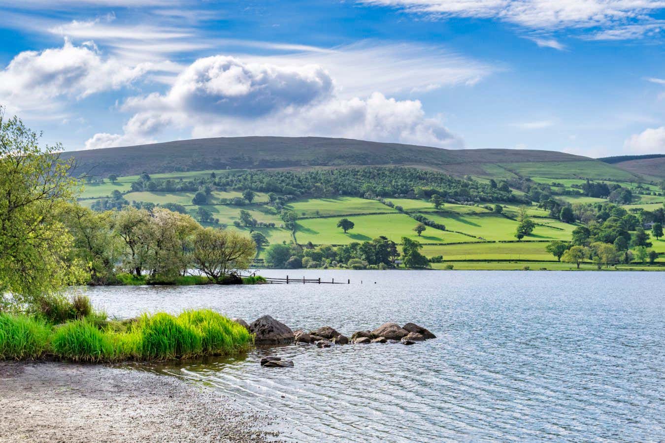 The head of Bala Lake, Llyn Tegid, in North Wales, on a fine spring evening.