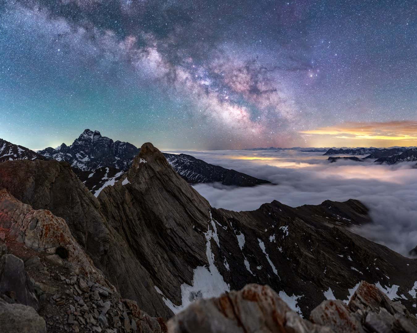 On Top of the Dream ? Jeff Graphy The Milky Way taken from the top of Pain de Sucre, on the French-Italian border. The photographer climbed the summit twice in search of optimum conditions. The settled clouds and the pastel colours create a serene view of the mountain range. Taken with a Canon EOS 6D camera, 35 mm f/2.8, ISO 6400; Sky: 8-second exposure; Foreground: 20-second exposure Location: Pain de Sucre, Queyras, France