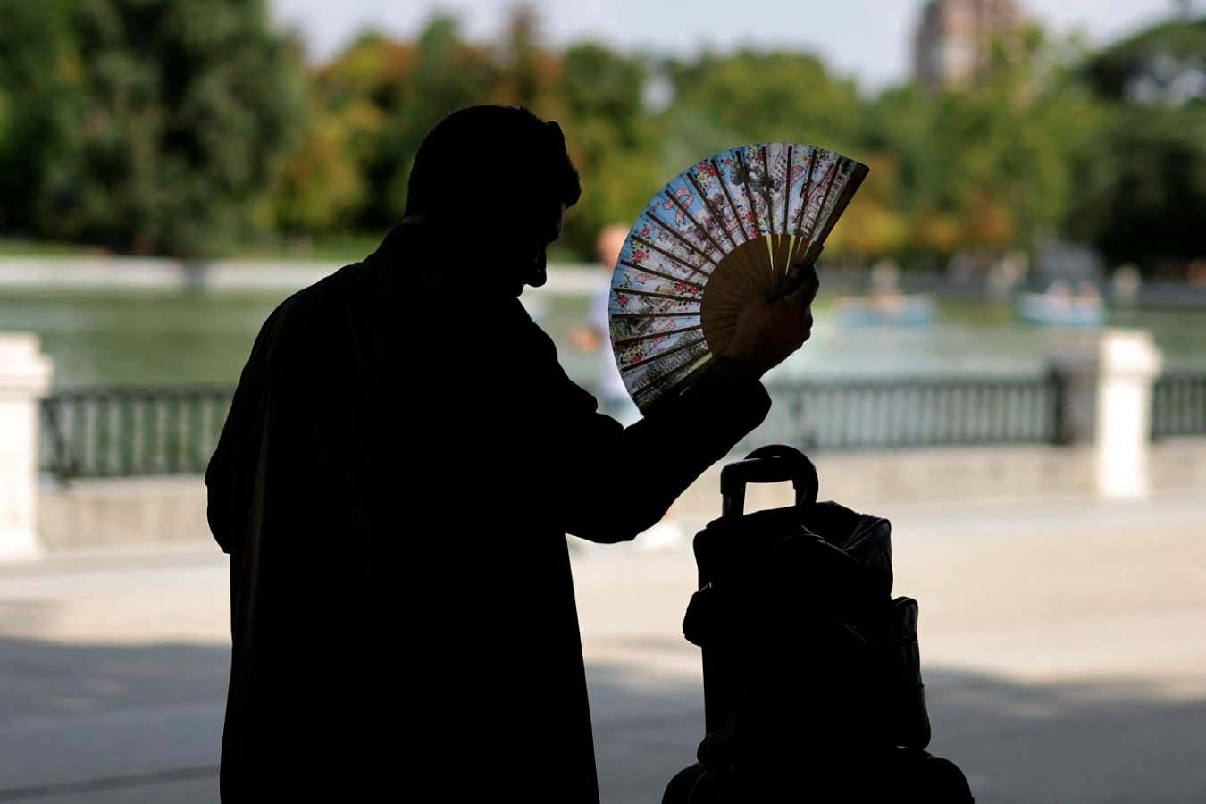 A man with a fan