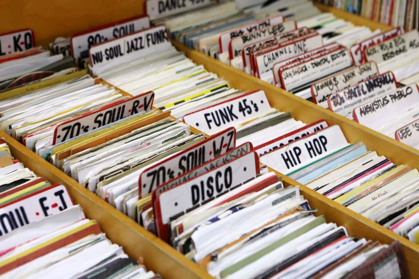 Various disco, soul and funk, seven inch records at second hand store.