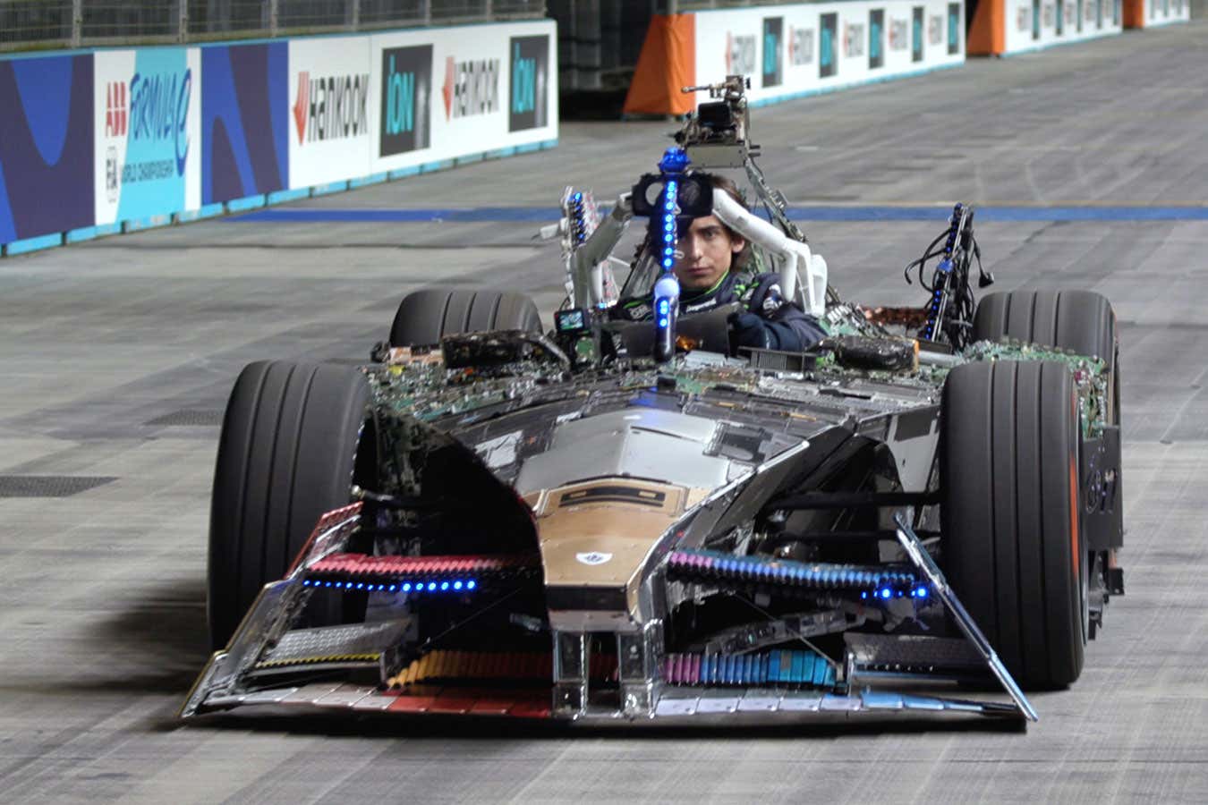 Aiden Gallagher drives racing car made from electronic waste