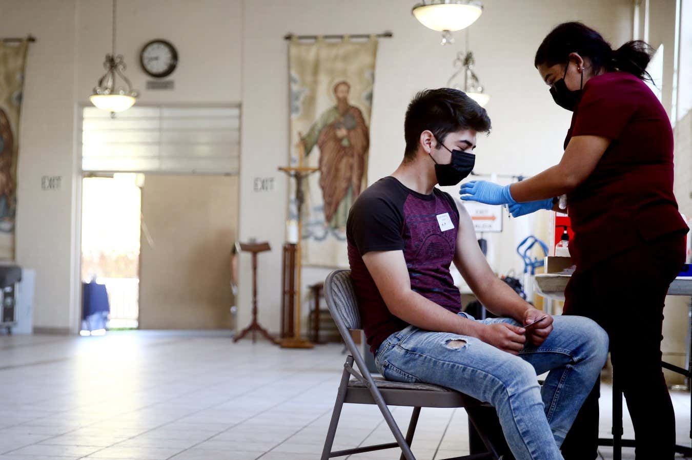 Someone being vaccinated against covid-19 in LA, California, in April 2021