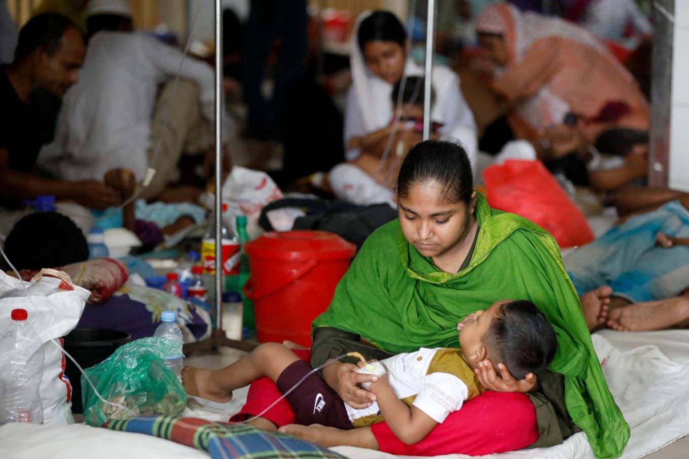 People with dengue in hospital in Dhaka, Bangladesh, in July