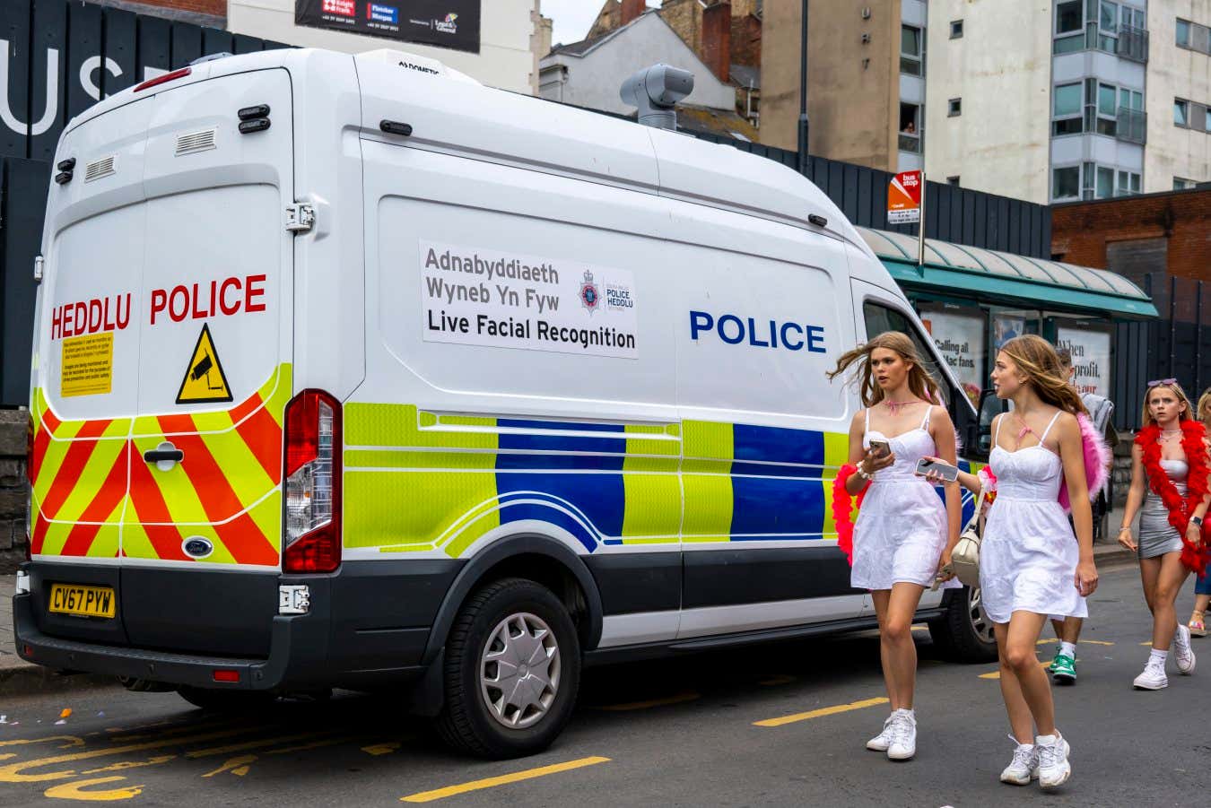 CARDIFF, WALES - JUNE 20: Police facial recognition cameras in operation on Westgate Street ahead of a Harry Styles concert at the Principality Stadium on June 20, 2023 in Cardiff, Wales. Members of the European Parliament recently backed an effective ban on live face recognition cameras in public. A live face recognition camera works by comparing faces with a