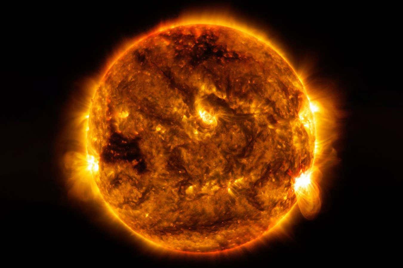 The sun with solar flares coming off it
