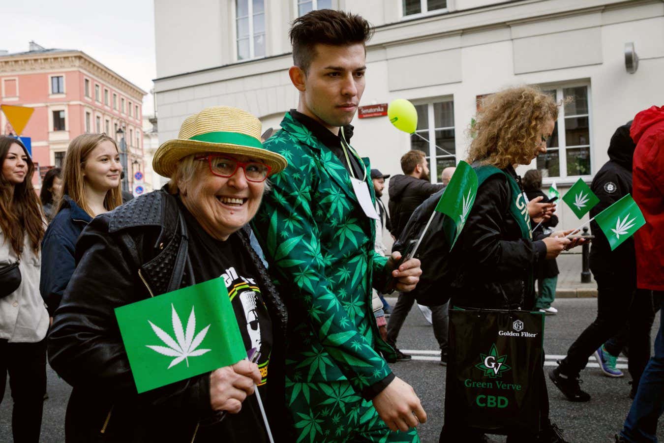 An elderly woman participates in a Marijuana liberation march in Poland