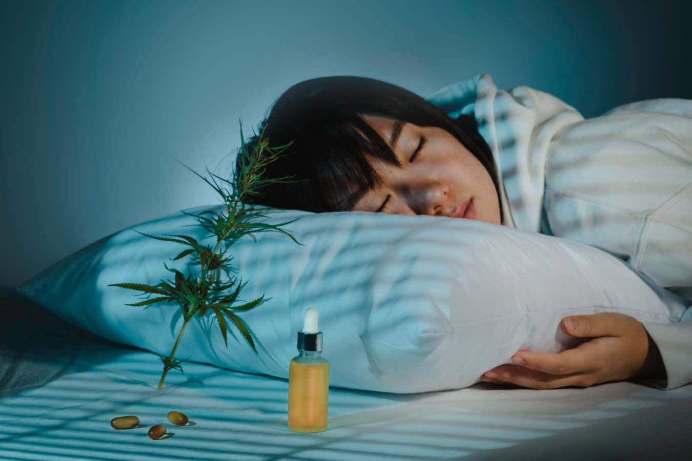 woman sleeping with cbd oil