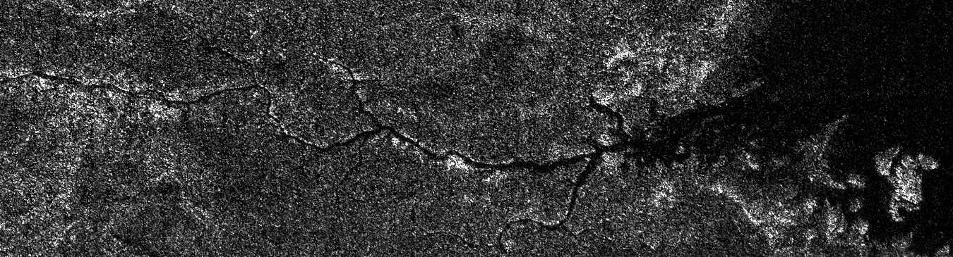 Titan's Nile-Like River Valley This image from NASA's Cassini spacecraft shows a vast river system on Saturn's moon Titan. It is the first time images from space have revealed a river system so vast and in such high resolution anywhere other than Earth. The image was acquired on Sept. 26, 2012, on Cassini's 87th close flyby of Titan. The river valley crosses Titan's north polar region and runs into Ligeia Mare, one of the three great seas in the high northern latitudes of Saturn's moon Titan. It stretches more than 200 miles (400 kilometers). Scientists deduce that the river is filled with liquid because it appears dark along its entire extent in the high-resolution radar image, indicating a smooth surface. That liquid is presumably ethane mixed with methane, the former having been positively identified in 2008 by Cassini's visual and infrared mapping spectrometer at the lake known as Ontario Lacus in Titan's southern hemisphere. Though there are some short, local meanders, the relative straightness of the river valley suggests it follows the trace of at least one fault, similar to other large rivers running into the southern margin of Ligeia Mare (see PIA10008). Such faults may lead to the opening of basins and perhaps to the formation of the giant seas themselves. North is toward the top of this image. The Cassini-Huygens mission is a cooperative project of NASA, the European Space Agency and ASI, the Italian Space Agency. NASA's Jet Propulsion Laboratory, a division of the California Institute of Technology in Pasadena, manages the mission for NASA's Science Mission Directorate, Washington. The Cassini orbiter was designed, developed and assembled at JPL. The RADAR instrument was built by JPL and the Italian Space Agency, working with team members from the US and several European countries. JPL is a division of the California Institute of Technology in Pasadena. https://www.nasa.gov/mission_pages/cassini/multimedia/pia16197.html
