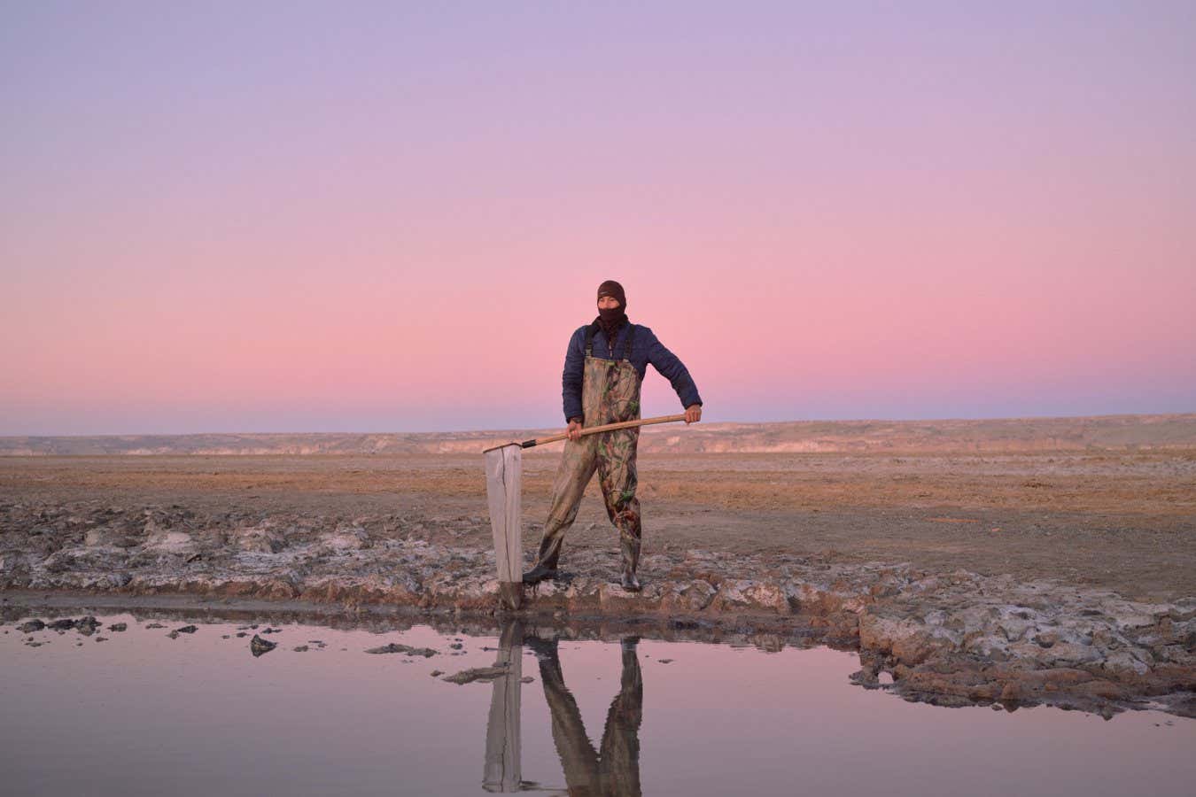 Quat is an artemia collector. Artemia is a primitive arthropod also known as brine shrimp, it is used as a rapidly growing food source for farm fish. The salinity level of the water in the Aral Sea does not allow any other life to exist in or near it. A tiny creature you can?t see with the naked eye is all the sea is willing to give.