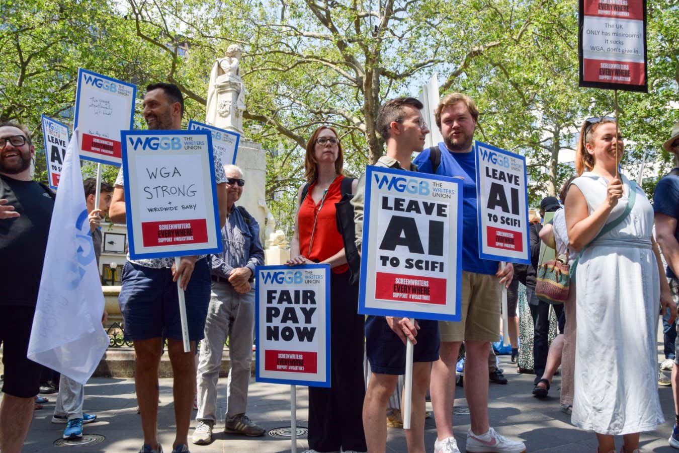 2R7B07K London, UK. 14th June 2023. UK screenwriters and Writers? Guild Of Great Britain (WGGB) members stage a rally in Leicester Square in solidarity with striking screenwriters in the USA. Credit: Vuk Valcic/Alamy Live News