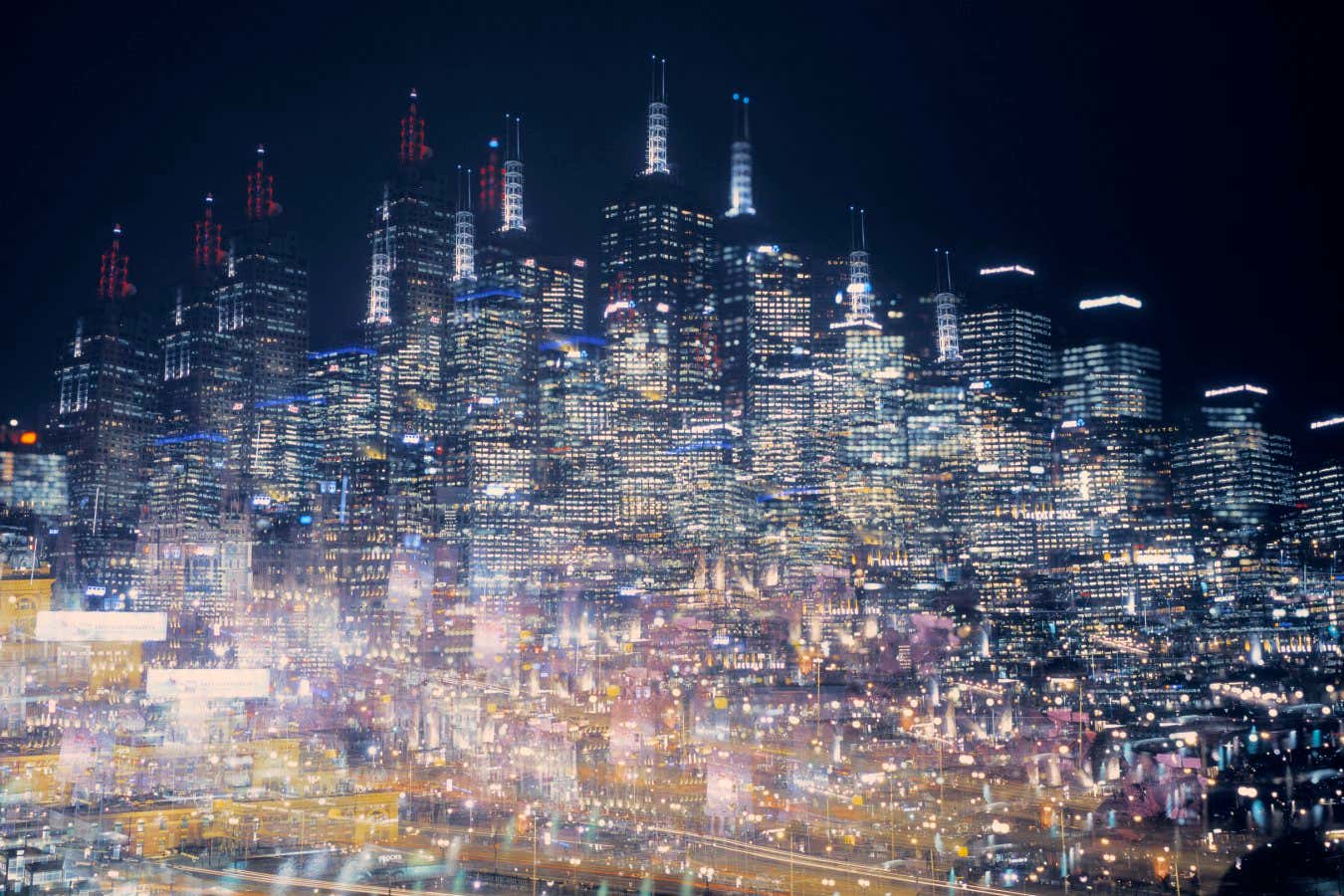 Multiple exposure image of an illuminated Melbourne skyline, Australia.