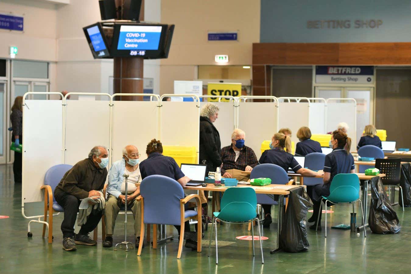 Covid-19 vaccinations being administered at Epsom Racecourse in Surrey, the UK