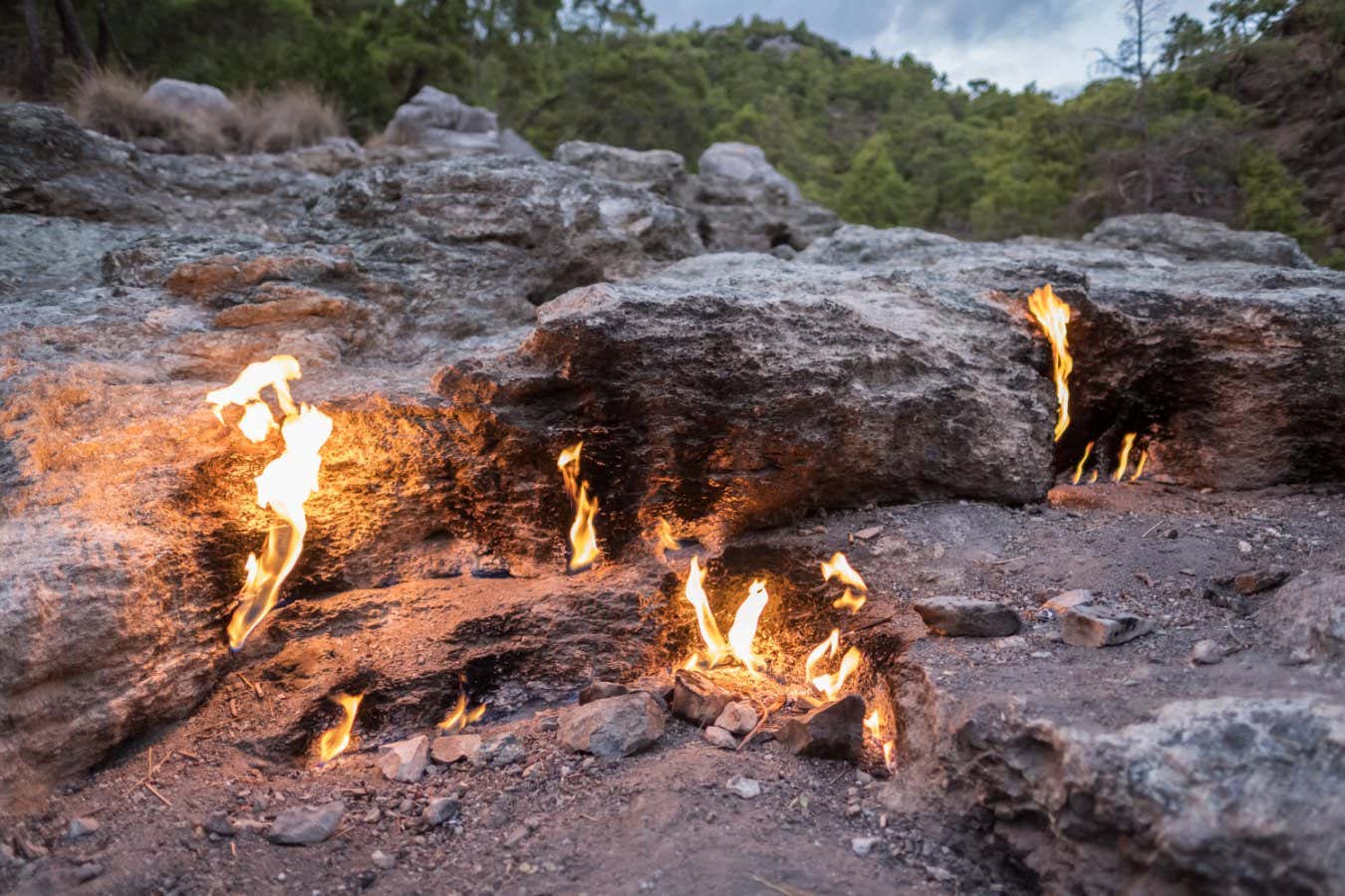 Flames of Chimera Mount from the underground. Fire from the natural gas in the rocks in Cirali, Turkey.; Shutterstock ID 1278290827; purchase_order: -; job: -; client: -; other: -