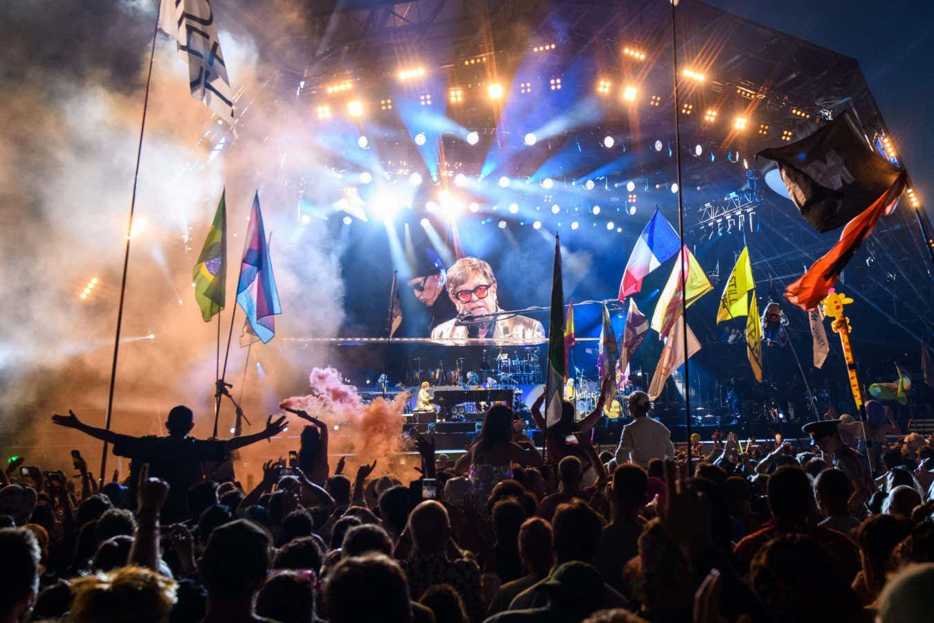 Elton John playing the piano at Glastonbury Festival in June 2023