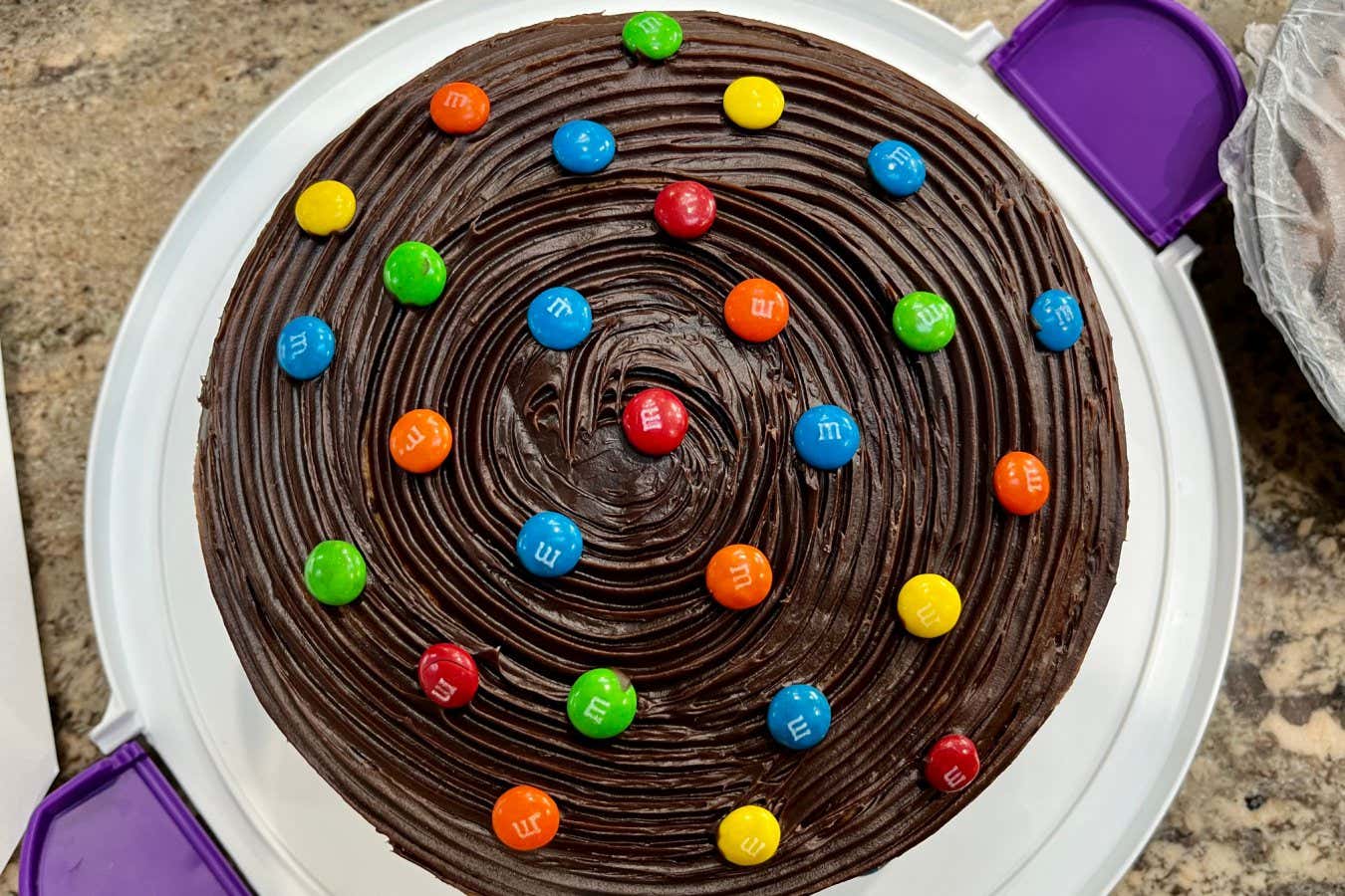 Islip Terrace, NY, USA, 9.4.23 - A chocolate pinata cake filled with chocolate covered candies.; Shutterstock ID 2380120693; purchase_order: -; job: -; client: -; other: -