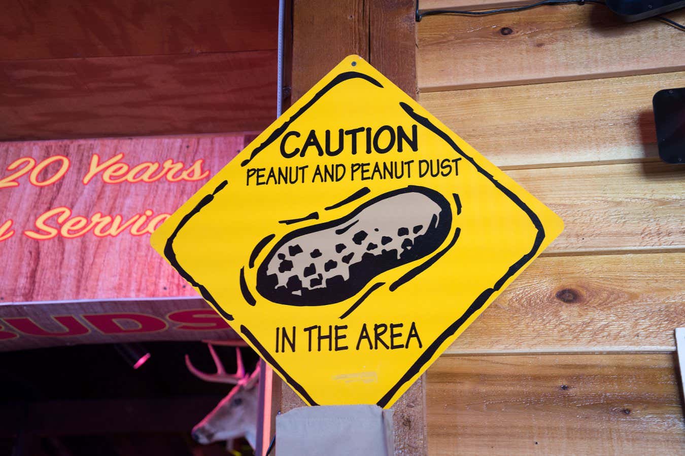 E098YY Peanut allergy sign in restaurant.
