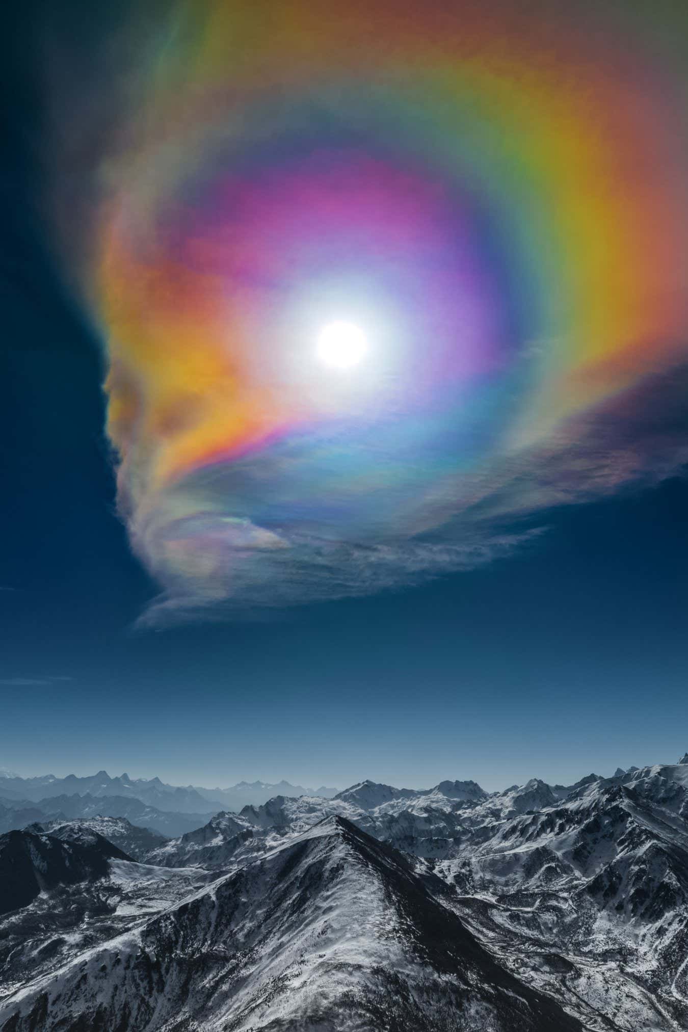 The Palette of the Himalayas ? Geshuang Chen (China) During the Spring Festival, the Sun and altostratus clouds acted together to create this huge corona, soaring above the Himalayas. The result is an enormous colour palette above the snowy peaks. Drone footage, DJI Mavic 3 Camera, 12.3 mm f/5, ISO 100, 1/3200-second exposure Location: Shigatse City, Xizang Province, China, 24 January 2023